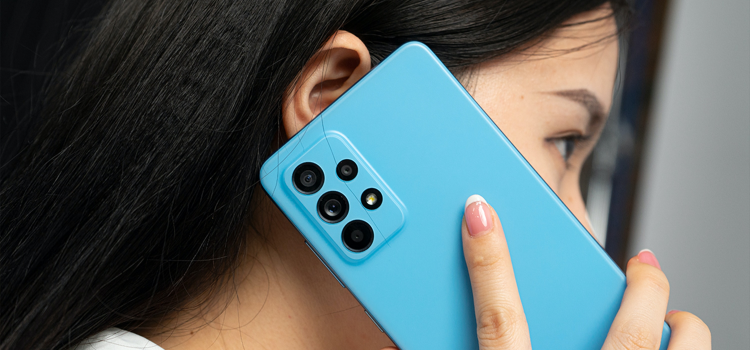 woman using blue phone